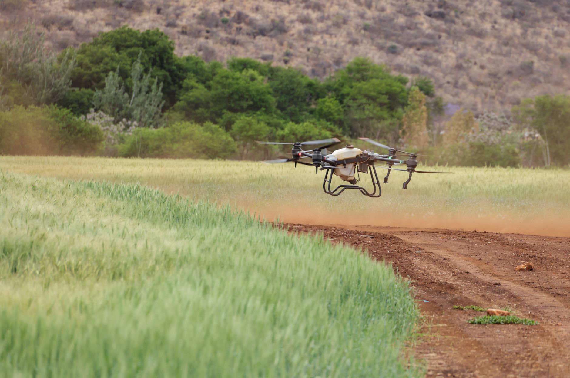 Agricultural drone flying over a field
